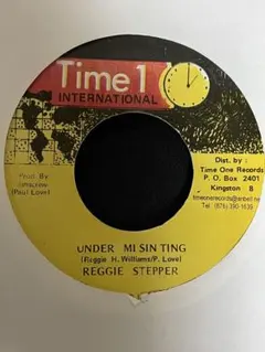 REGGIE STEPPER / UNDER MI SIN TING レコード