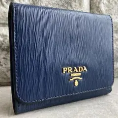 希少✨美品✨プラダ 三つ折り財布 ヴィッテロダイノ ゴールドロゴ金具 ブルー系のサムネイル