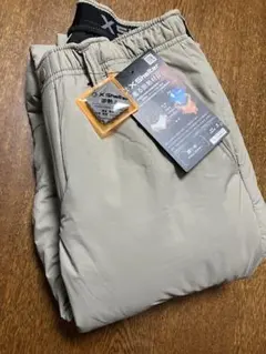 [新品]エックスシェルター(R)断熱βウォームクライミングパンツ Sベージュ