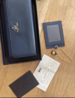PRADA 長財布 ブルー系 箱・カード付き - メルカリ