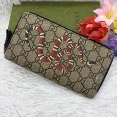 美品✨グッチ　長財布　ラウンドファスナー　蛇　GGスプリーム　PVC レザー　茶