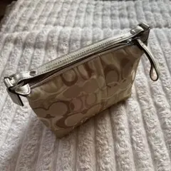 COACH シグネチャー ミニポーチ　バッグ　ゴールドベージュ系