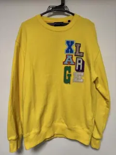 X-LARGE マルチカラーカレッジロゴクルーネックスウェット イエロー