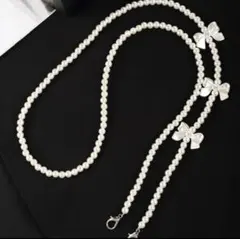 スマホショルダー リボン ホワイト　ビーズ　チェーン ストラップ  シンプル