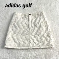 美品 アディダスゴルフ 中綿スカート 防寒防風 キルティング アイボリー M