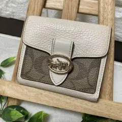 COACH 二つ折り財布 シグネチャー ホースアンドキャリッジ - メルカリ
