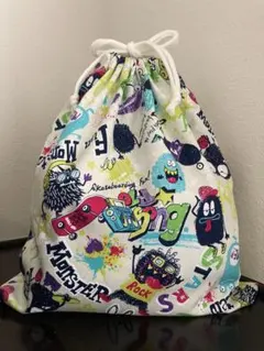 巾着袋　オフホワイトモンスター柄