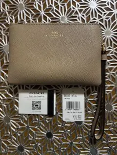 【新品未使用】COACH ベージュ レザー フラグメントケース