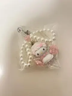 ホワイトフリルデザインシリーズ　シークレットストラップ　ハローキティ