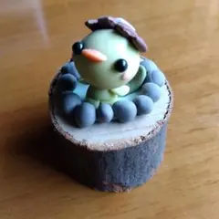 切り株に乗ってるカッパ
