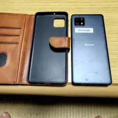 docomo AQUOS スマートフォン 本体 レザーケース付き