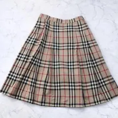美品✨バーバリー　ベルト付きプリーツ　スカート　ノバチェック 巻きスカート　38 美品】バーバリーブルーレーベル定番ノバチェックミニ巻きスカート38