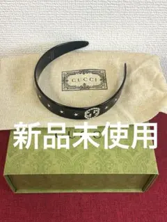 新品未使用！GUCCI グッチ カチューシャ 黒 ブラックロゴ ヘアアクセサリーのサムネイル