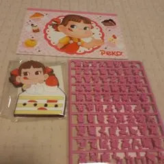 ペコちゃんデザインの お名前 ラバー チャーム とノート のセット