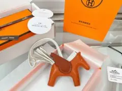 HERMES ロデオチャーム PM オレンジ レザー ペガサスモチーフ