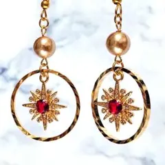 3/31まで限定価格★【ピアス】太陽モチーフ×フープ ジルコニア赤 エスニック風