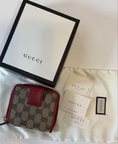 GUCCI GGパターン 二つ折り財布コンパクトウォレットラウンドジップ