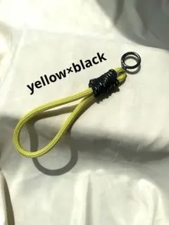 スマホストラップ パラコード ハンドストラップ　男女兼用（イエロー×黒）