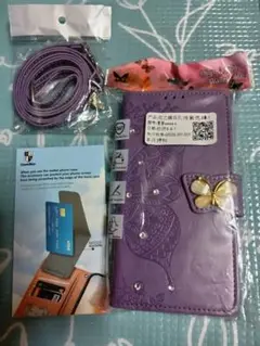 AQUOSsense4.sense5蝶模様の合成皮革財布型ケース