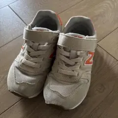 New Balance 373 ベージュ/オレンジ スニーカー