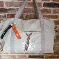 ボストンバッグKiplingライトグレー ロゴ付き