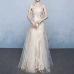 一着のみ限定価格 ゴールドのオシャレなデザインのロングドレス