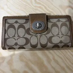 コーチ 長財布 ブラウン ロゴ入り　シグネチャー柄