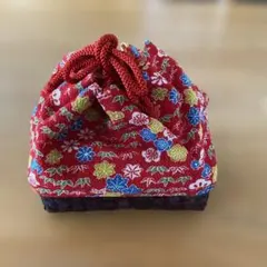 赤い花柄巾着型和装用バッグ