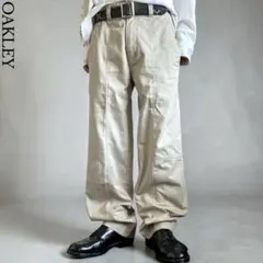 美品 00s OLD OAKLEY 変形 カーゴパンツ W33 Y2Kギミックのサムネイル