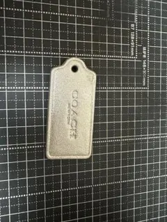 COACH シルバー タグ型キーホルダー