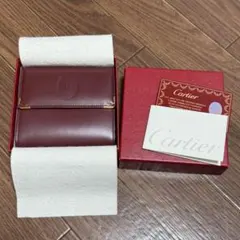 Cartier マストライン 三つ折り財布 ボルドー ヴィンテージ 未使用のサムネイル