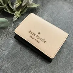 katespade.ケイトスペード.折り財布.ベージュ.ブラック.黒.コンパクト