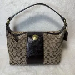 COACH シグネチャー ハンドバッグ タッセル付き - メルカリ