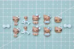 日焼けキティちゃん ネイルパーツ12個 ブルー