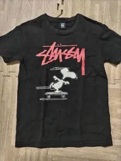 ステューシー stussy 150 スヌーピーコラボ スケートsk8黒 Tシャツ