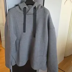 ポンチ素材グレー パーカー ドローストリング付き可愛い