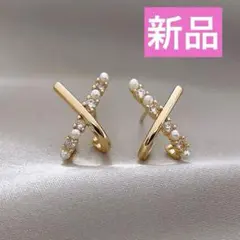 【新品✨️】クロスパールゴールドキラキラ ピアス結婚式韓国メレダイヤブランド系
