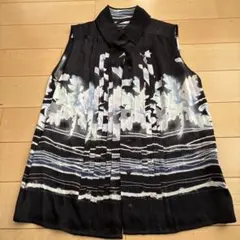 CHANEL ノースリーブ ブラウス 総柄 ロゴボタン - メルカリ