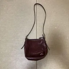コ*ン様 Kのダークブラウンレザーショルダーバッグ