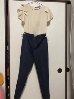 リボン付きトップスとチェックパンツセットアップ