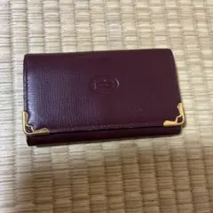 Cartier バーガンディ レザー キーケース ゴールド金具のサムネイル