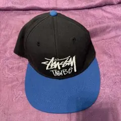 Stussy 黒青 スナップバックキャップ