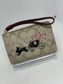 COACH ウサギと馬車のプリント　ストラップつきコンパクトポーチのサムネイル