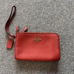 COACH レザー リストレット ポーチ　オレンジ　財布のサムネイル