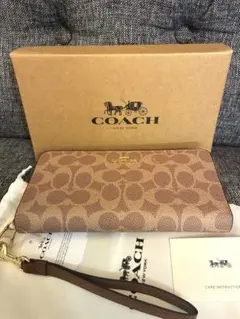 新品未使用COACHコーチシグネチャーロングジップウォレット