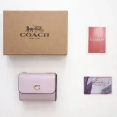 【新品・未使用】COACH ピンク 折り財布 型番:CZ111のサムネイル