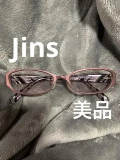 JINS Airframe メガネ ピンク系。薄いサングラス。