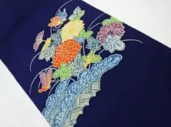 正絹　型染　縮緬地　菊・蝶模様　名古屋帯　353.5cm