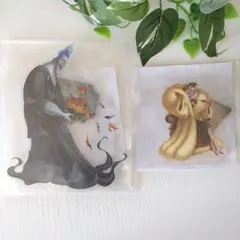 ディズニーセガラッキーくじ アクリルスタンド ハデス クルエラ 2点セット