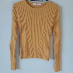 【SLY】（スライ） のオレンジ色のリブ編み長袖ニット